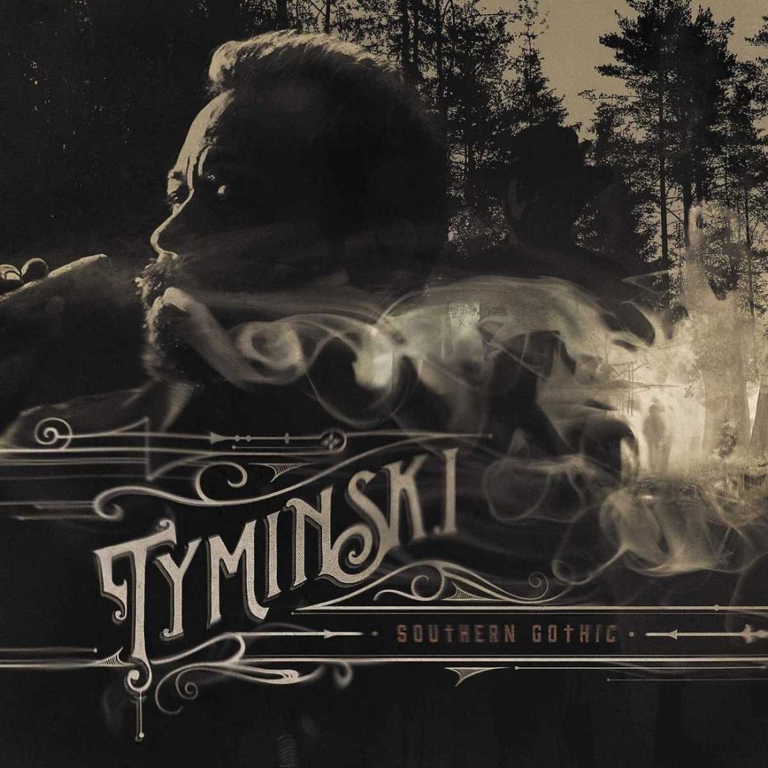 Album cover for Southern Gothic by Dan Tyminski. Displays dark shaded picture of man exhaling cigar smoke with trees in the background.